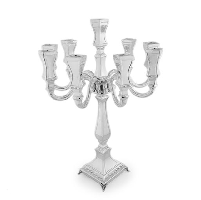 Silver candelabra on white background