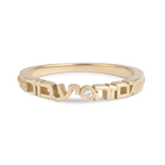 Gold diamond ring on white background