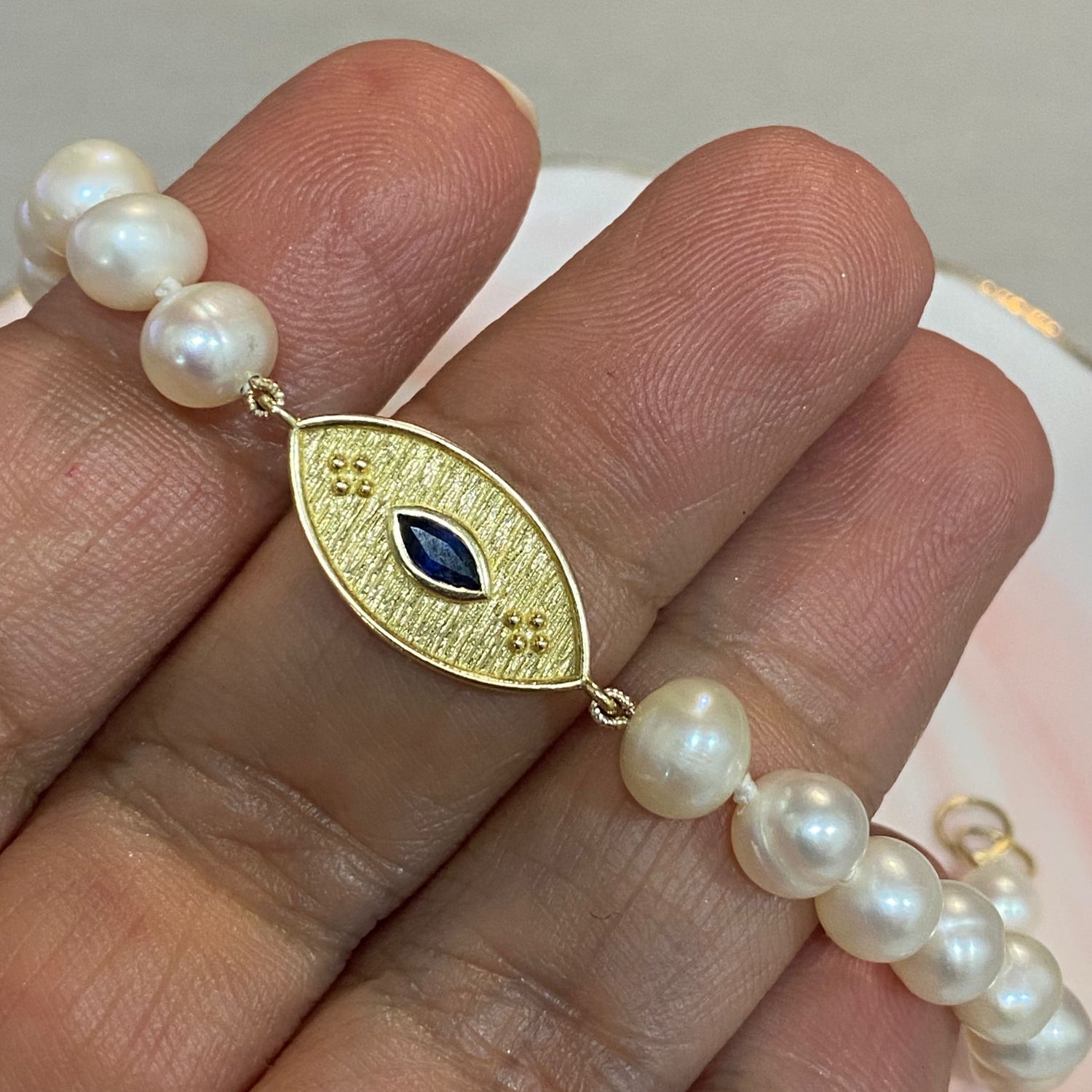 Guardian Spirit – 14K Gold Blue Sapphire Charm Bracelet