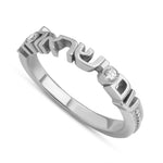 Silver ring with diamond accents on white background