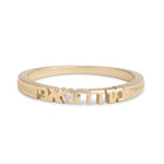 Gold ring with EXOTICA engraving