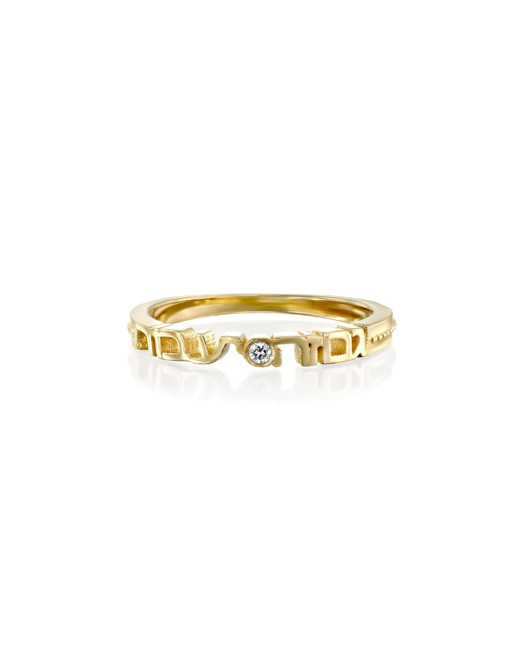 Gold ring with diamond on white background