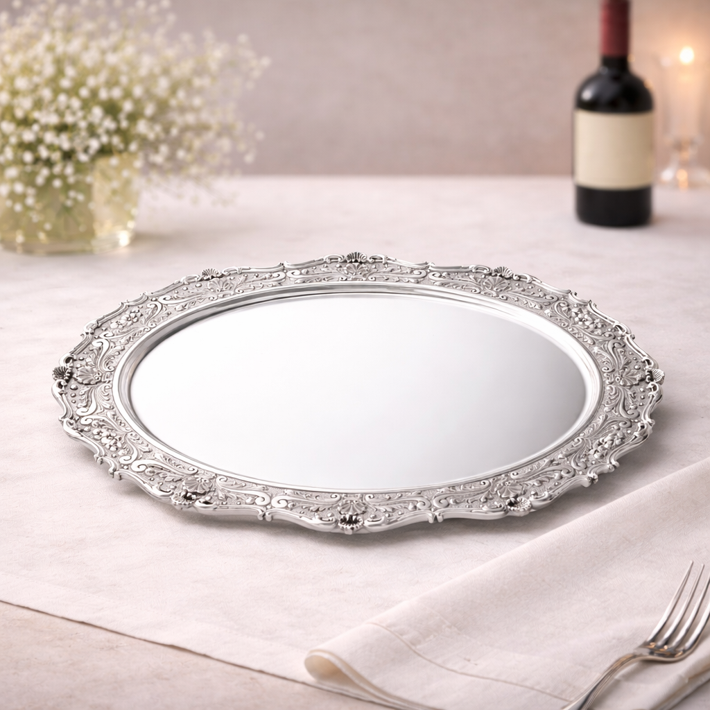 Silver platter on table with wine bottle