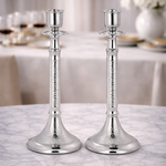 Two silver candlestick holders